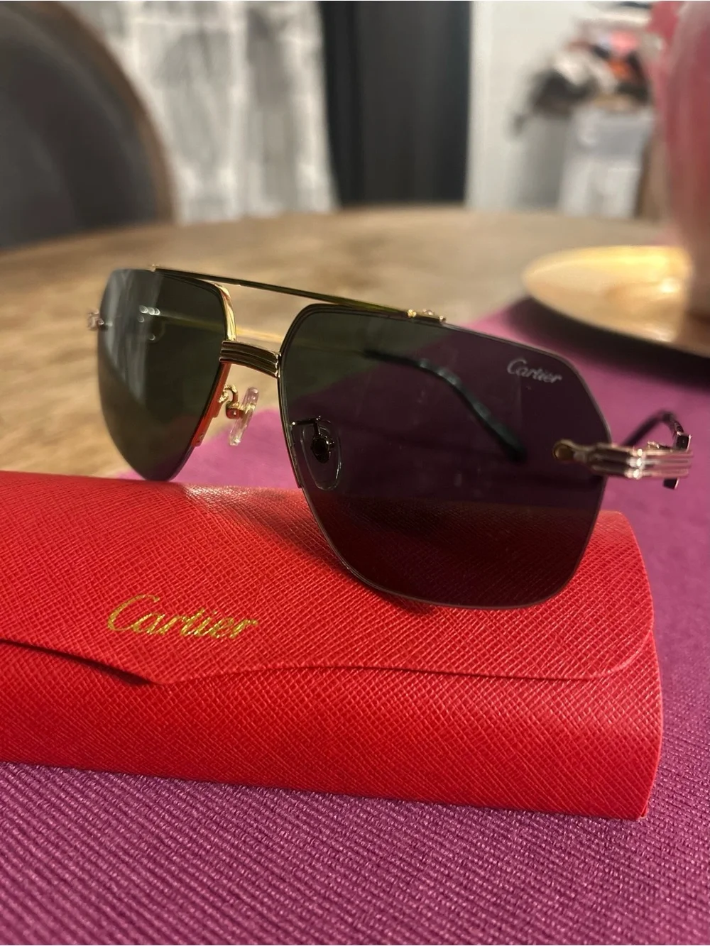 Cartier Gold Rimless Sunglasses with Dark Lenses